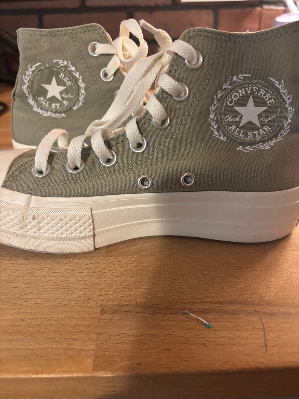 Converse High Top Canvas Sneakers in Olive and Cream
